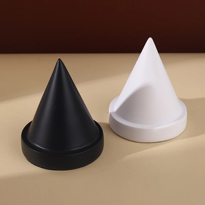 Minimalist resin cone jewelry stand for ring display and storage in black and white