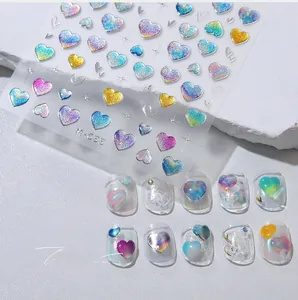 Detail of M-655 laser holographic heart nail stickers with finished transparent nail art effects