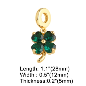 Golden four-leaf clover pendant with green gemstone, 28mm x 12mm x 5mm jewelry charm