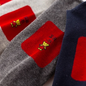Breathable cotton crew socks for men featuring red soles and cute bear pattern details