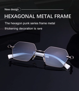 Detail of black hexagonal metal frame sunglasses with punk style and mirror reflection