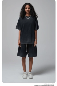 Detailed view of washed grey cotton oversized T-shirt and drawstring shorts street set