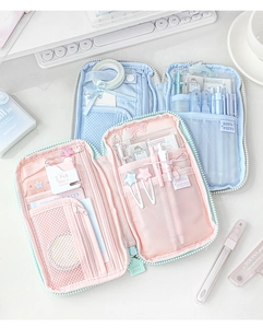 Detailed interior of multi-functional stationery bag showing mesh pockets and pen holders