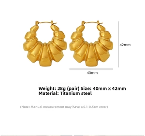 Detail view of gold titanium steel croissant earrings with 40mm x 42mm size specs