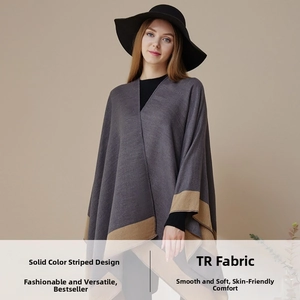 Detail of soft TR fabric texture on taupe striped poncho wrap for women