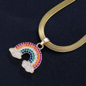 Macro detail of rainbow cloud pendant necklace with colorful zircons and golden snake chain