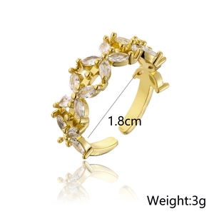 Detail showing 1.8cm inner diameter and 3g weight of the gold zircon geometric ring