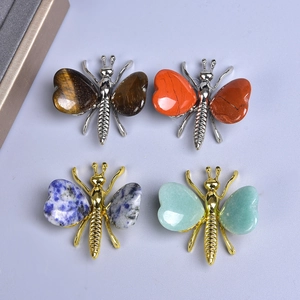Set of four butterfly ornaments crafted with natural stones and metal wings