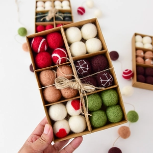 24Pcs Christmas wool felt balls set with snowflake patterns in a kraft gift box
