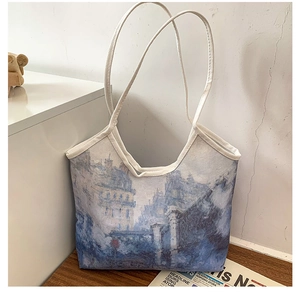 Detail of artistic oil painting print canvas tote bag on a minimalist wooden surface