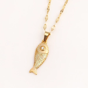 Elegant gold koi fish necklace with enamel scales and sparkling rhinestone eye detail