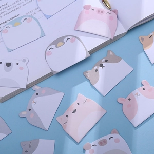 Cute cartoon animal sticky notes set with penguin and pig shapes on a blue background