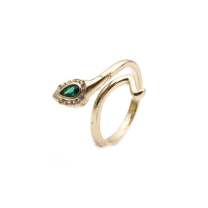 Adjustable gold serpent ring with green teardrop zircon and white accents on white background