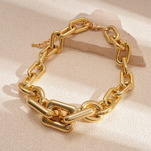 Statement chunky gold acrylic metal chain necklace with industrial link design for women