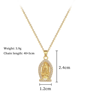 Detail view of gold oval medallion necklace with rhinestones and size specifications