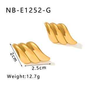 Detailed size view of gold winged earrings measuring 2cm by 2.5cm weighing 12.7g