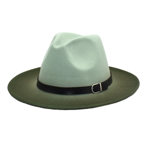 Detail of two-tone wool felt fedora showing green gradient and black belt with buckle