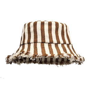 Close-up of brown and white striped bucket hat featuring natural frayed edge details