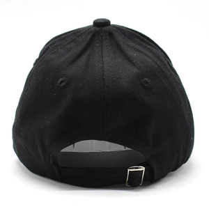 Detail of adjustable silver metal buckle and twill cotton texture on back of black cap