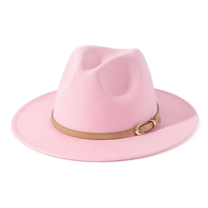 Close-up of pink wool felt jazz fedora with brown leather band and gold buckle detail