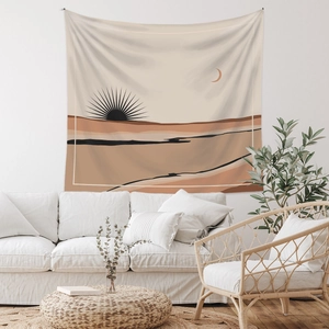 Detail of bohemian wall tapestry featuring abstract desert sun and moon art in earth tones