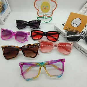 Various colorful cat-eye sunglasses featuring chic gold triangle temple accents