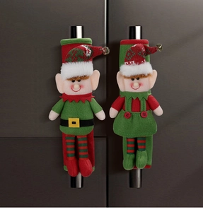 Plush Christmas elf refrigerator handle covers with bells on dark wooden handles