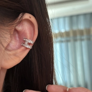 Elegant H-shaped silver ear cuff with zircon crystals, worn on the ear bone for non-pierced ears