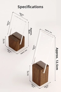 Macro detail of walnut wood and acrylic earring stands with dimensions for jewelry display