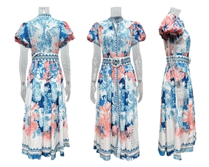 Detailed views of summer maxi dress with bohemian print, puff sleeves and belt