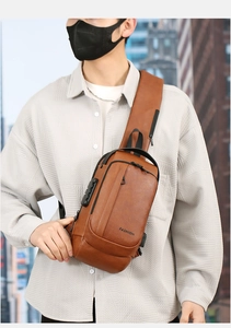 Brown vintage faux leather chest bag with anti-theft lock worn by a male model