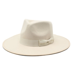 Close-up of beige wool fedora featuring a matching grosgrain ribbon and bow detail