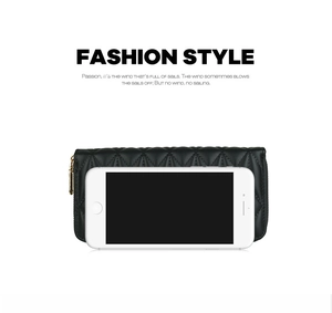 Detailed view of black quilted PU leather long wallet size compared with a smartphone