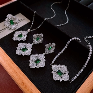 Luxury emerald flower jewelry set including necklace and ring in black velvet gift box