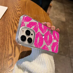 Detail of transparent iPhone case with pink lip patterns and raised camera protection