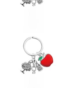 Detail of teacher appreciation keychain with tree, owl, and apple charms in silver finish