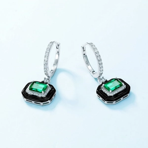 Vintage S925 silver drop earrings with green emerald-cut stones and black enamel frame