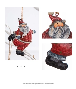 Detail of vintage metal Santa Claus ornament with rustic painted finish and twine hanger
