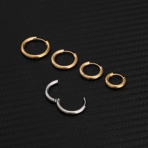 Classic stainless steel hoop earrings in gold and silver showing multiple size variations