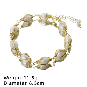 Handmade freshwater pearl bracelet wrapped in gold wire with adjustable extender chain