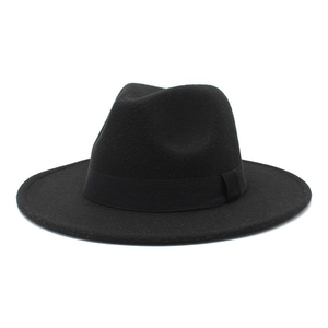 Classic black wool felt fedora hat with wide brim and matching grosgrain ribbon for winter