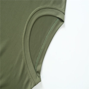 Close-up of olive green mesh gym shorts showing breathable fast-drying fabric texture