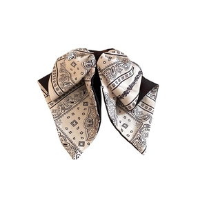 Elegant vintage bow hair claw clip with black and white paisley bandana print