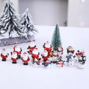 Miniature Christmas resin figurines set featuring Santa Claus and snowman in a snow scene