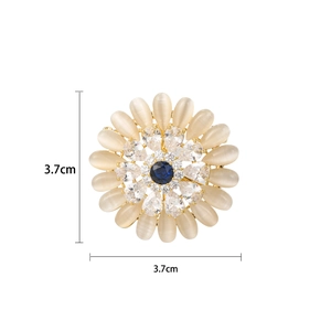Golden sun flower brooch with blue opal and cubic zirconia, 3.7cm diameter size