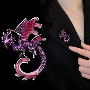 Exaggerated silver dragon brooch with purple gradient enamel and red rhinestone eye