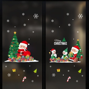 Christmas window decals set featuring Santa, trees, and snowmen on dark glass background