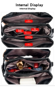 Internal display of black lychee leather tote showing multiple pockets and compartments