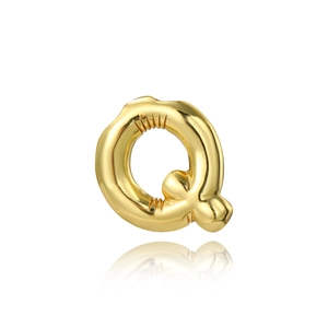 Macro shot of 18K gold plated letter Q balloon pendant with a glossy metallic finish