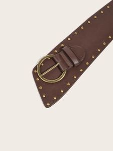 Close-up of brown leather wide waist belt with round metal buckle and studded edge details